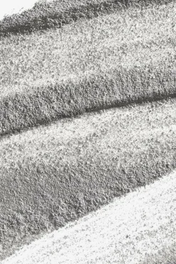 Gommage mécanique et enzymatique anti-pollution au charbon actif Daily Superfoliant