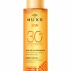 Huile bronzante visage et corps haute protection SPF30 Nuxe Sun
