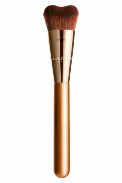 Pinceau fond de teint inspiré du Gua Sha